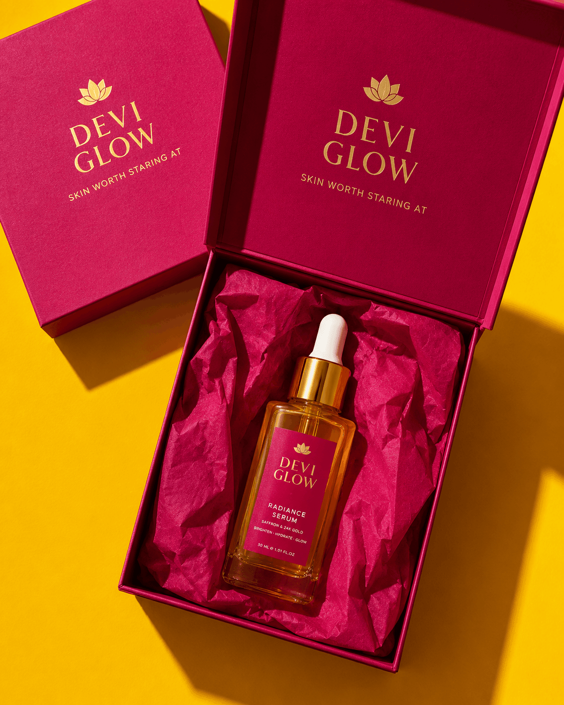 Gold serum campaign image with vivid product shadow